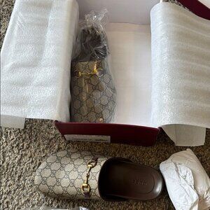 Gucci mule slippers in GG Supreme canvas